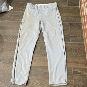 Augusta sportswear grey adult large black stripes on side.